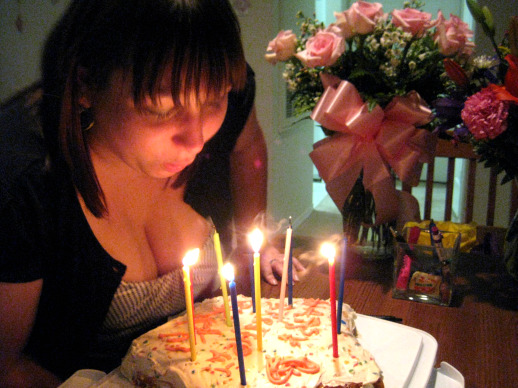 Brandi blowing out candles